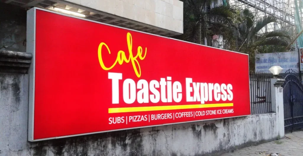 alt="Glow sign board - popular signage option for businesses in India"